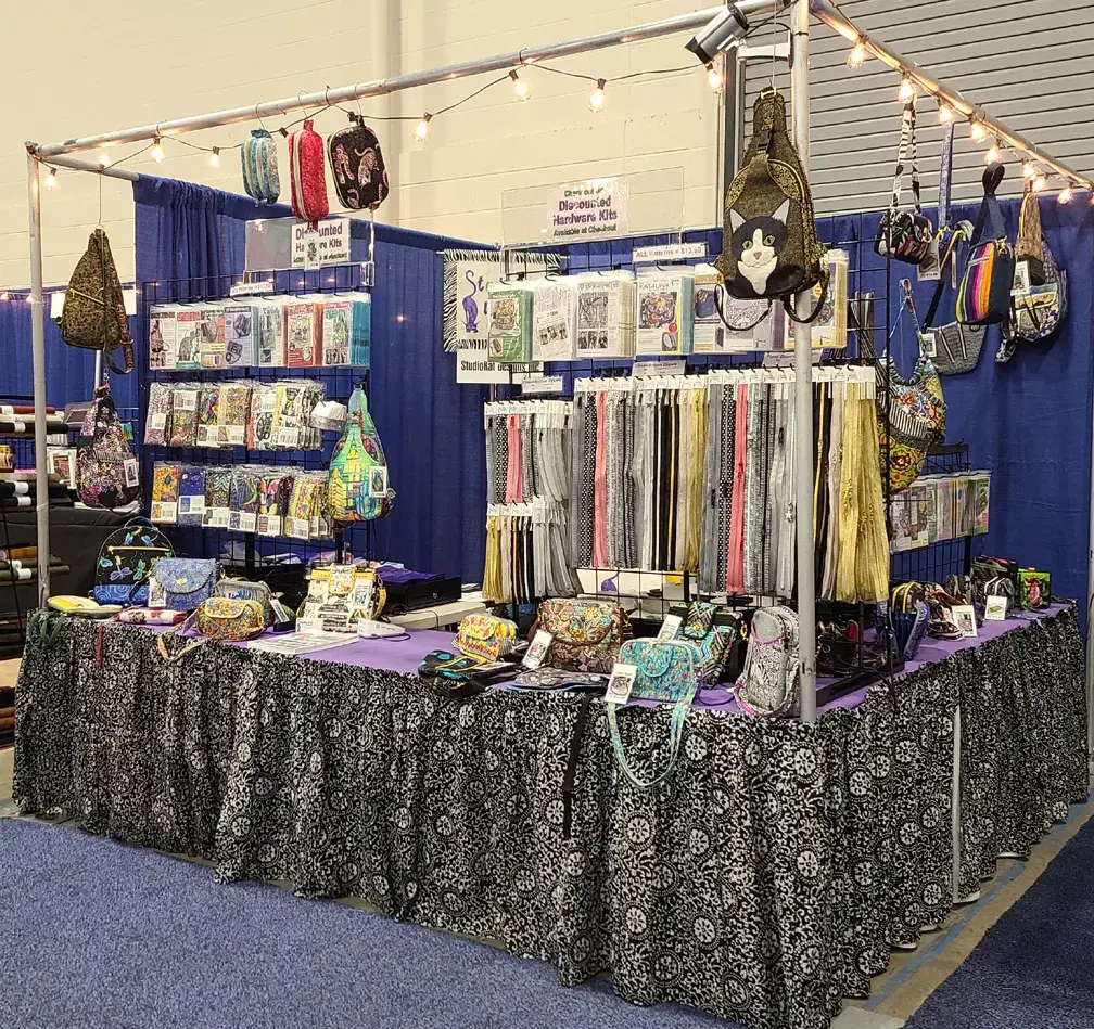 A booth with a variety of items on display.