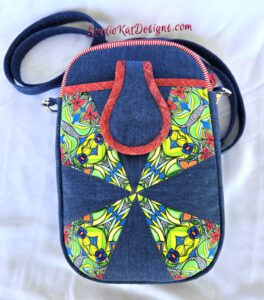 A blue bag with a yellow and red design on it.