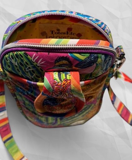 Colorful backpack with multiple compartments and a vibrant design.