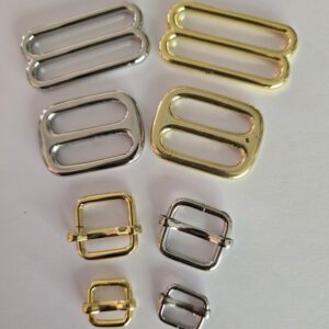 A group of different types of metal buckles.