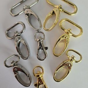 A bunch of different types of metal keychains