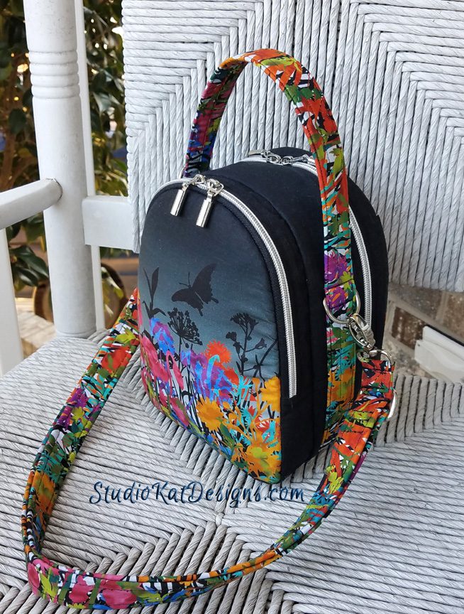 A bag with butterfly design on the chair