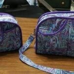 Two bags by Studio Kat Designs on the table