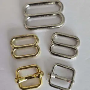 A group of different types of metal buckles.