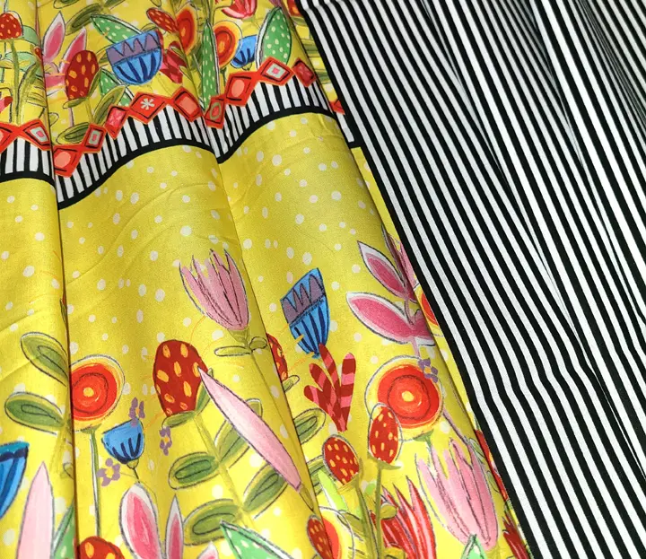 A close up of the Double Take, a yellow and black striped fabric.
