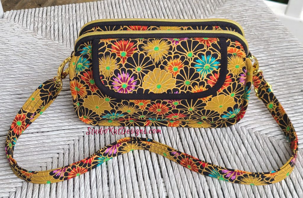 A bag with a colorful floral pattern on it.