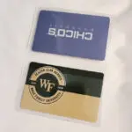 Two plastic cards with the word choco on them.