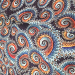 A close up of the fabric with swirls and spirals