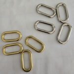 A group of metal rings sitting on top of a table.