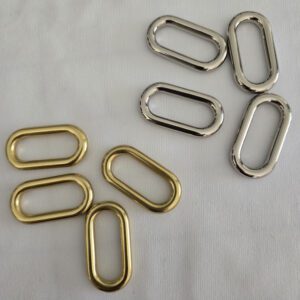 A group of metal rings sitting on top of a table.
