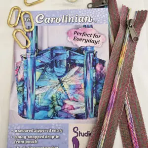 A close up of some zippers and scissors