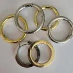 A group of metal rings sitting on top of a table.