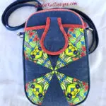 A blue bag with a yellow and red design on it. A blue bag with a yellow and red design on it.
