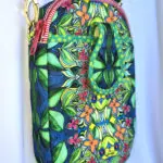 A colorful bag hanging on the wall A colorful bag hanging on the wall