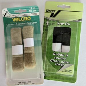 Two packages of velcro are shown on a table.