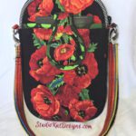 A red poppy bag with a black background