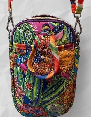 Colorful embroidered bag with floral and bird designs.