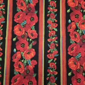 Red poppy flowers with green leaves on black and red striped fabric.