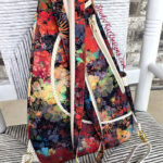 Colorful floral backpack with rope straps