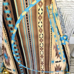 Southwestern striped backpack with turquoise zipper