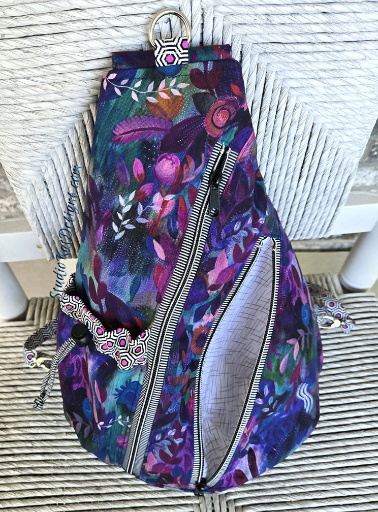 Colorful purple floral zippered sling bag